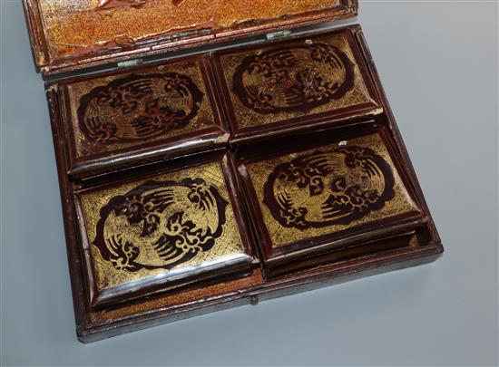 A lacquer box of Mother of Pearl gaming counters